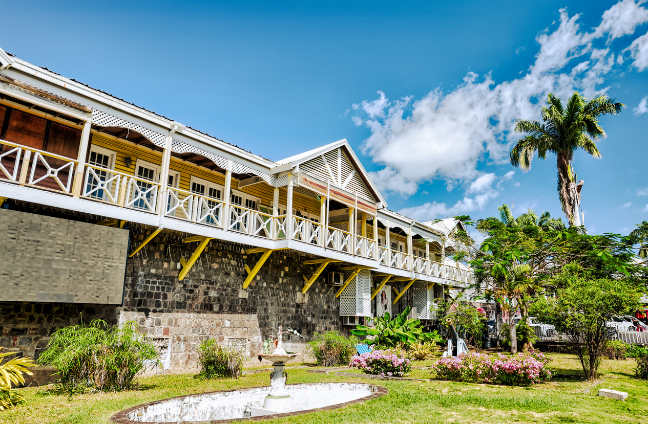Tropical sights  and buildings of the port town of Basseterre in Saint Kitts and Nevis - Journey House Travel