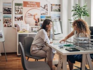 Woman planning summer vacation - Journey House Travel